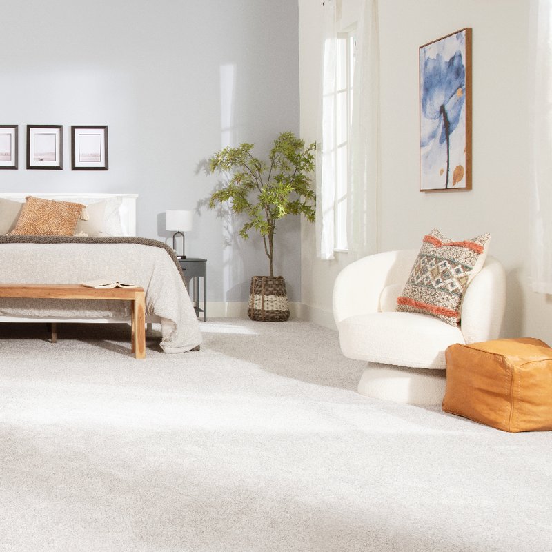 Bright bedroom with Mohawk SmartStrand Carpet flooring